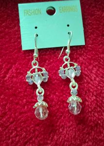 Brand new Elegant Drop Earrings with Purple Stones