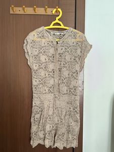 Net Jumpsuit With Bottons In Front To Open