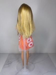 Reserved Barbie Doll in Orange Dress