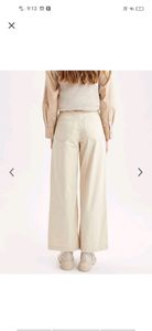 Beige flared jeans women