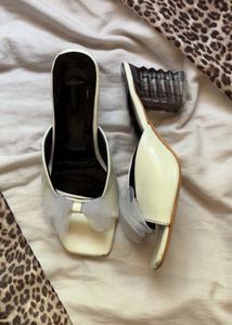 Chic White Mules with Blue Bow Detail