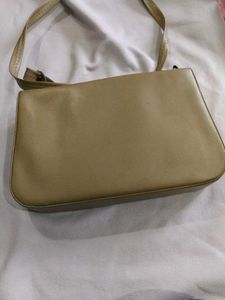 Stylish Beige Shoulder Bag with Chain Detail