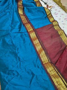 Elegant Teal Saree with Gold Border