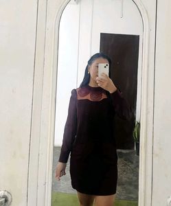Chic Burgundy Mini Dress with Unique Neckline Deta