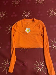 Orange Cropped Long Sleeve Top with Flower