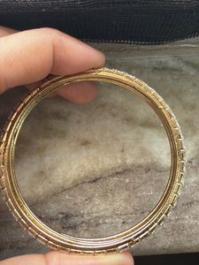 Sparkling Cz Bangle set in dull gold— 4 pcs