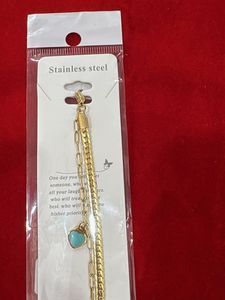 Gold Tone Charm Bracelet