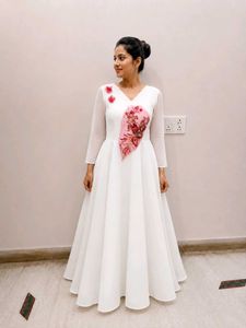 elegant white gown with floral emblishmnent