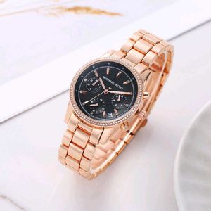 Michael Kors Rose Gold Green Dial Watch