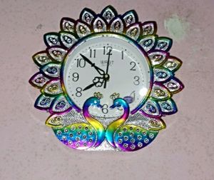 "Peacock Wall Clock: Elegant Modern Timepiece for Home Decor 🦚🕰️"
