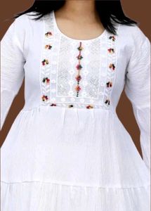 Elegant White Tiered Kurta with Tassels