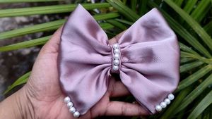 Elegant Black Pearl Bow Hair Clip