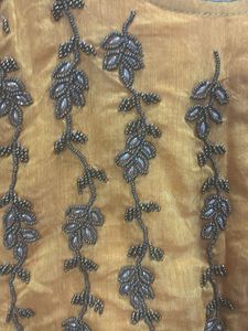 Yellow Embroidered Kurta with attached skirt style