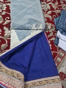 Elegant Blue Saree with Intricate Border