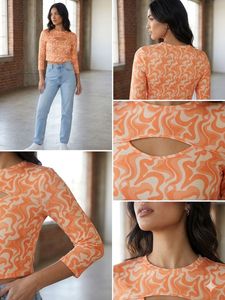 Orange Swirl Cut-Out Long Sleeve Top