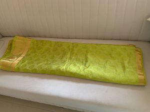 Vibrant Green Silk Saree with Gold Border