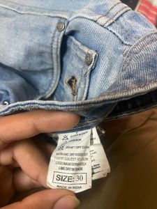 Light Wash Denim Jeans with Bear Patch