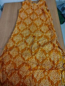 Mustard Yellow Printed Sleeveless Kurti