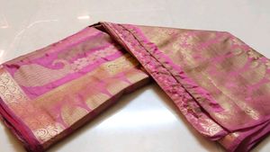 Elegant Pink Saree with Gold Paisley