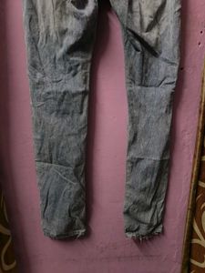 Distressed Light Wash Denim Jeans