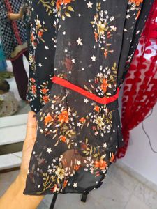 Chic Floral Print Top with Red Trim