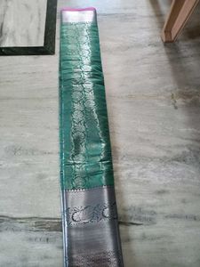 Exquisite Teal Silk Saree with Silver Border