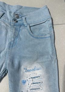 Light Wash Distressed Jeans with Heart Detail
