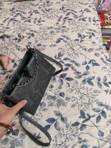 Stylish Grey Handbag with Chain Detail