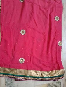 Elegant Pink Saree with Embellishments
