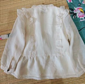 Elegant White Ruffled Blouse