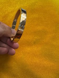 Elegant Gold Tone Bangle