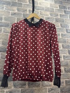 Chic Polka Dot Blouse with Lace Cuffs