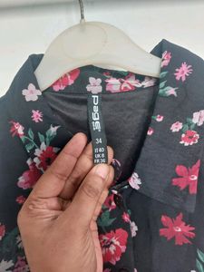 Floral Printed Full Sleeve Buttoned A Line Dress.