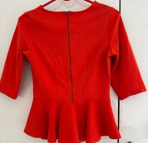 Vibrant Orange Peplum Top