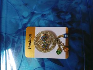Sparkling Brooch with Tassel Detail
