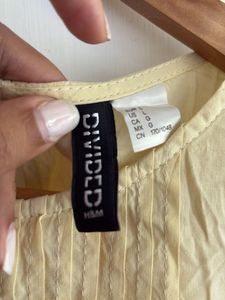 Light beige Flutter Sleeve Top