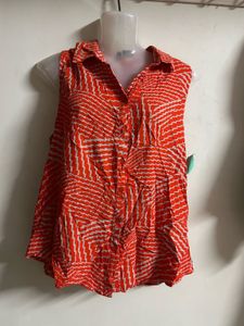 Vibrant Orange Sleeveless Blouse