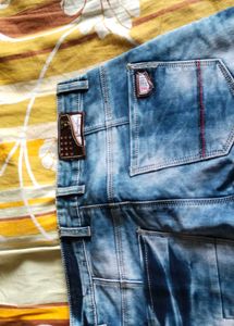 Distressed Blue Wash Denim Jeans