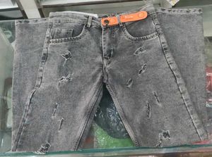 Ripped Grey Jeans