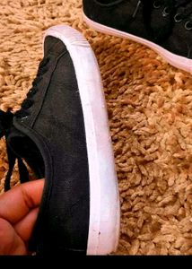 Black Canvas Sneakers available in coins