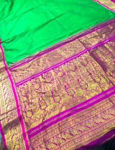 Vibrant Green Silk Saree with Pink Border