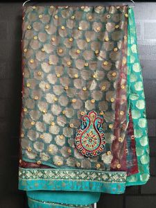 Elegant Teal Saree with Embellishments
