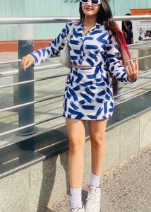 stylecast x hersheinbox women shirt with skirt.