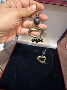 Heart Dangle Earrings and pearl bangles.