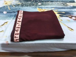 Maroon saree with Embroidered Border