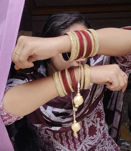 Elegant Red &amp; Gold Bangles with Tassel