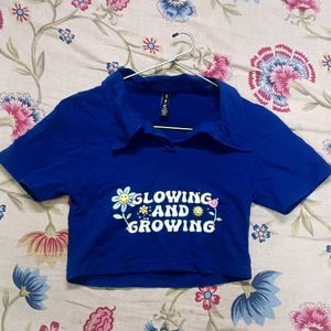Blue Crop Top with "Glowing & Growing" Graphic