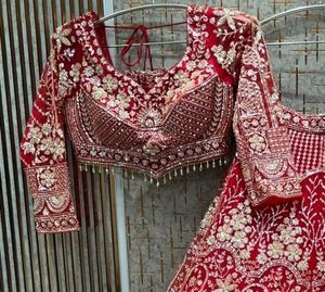 Stunning Red Embellished Lehenga Choli