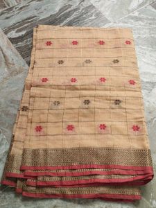 Elegant Beige Saree with Red Blouse Piece