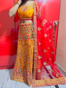 Exquisite Yellow &amp; Red Embroidered Lehenga Choli